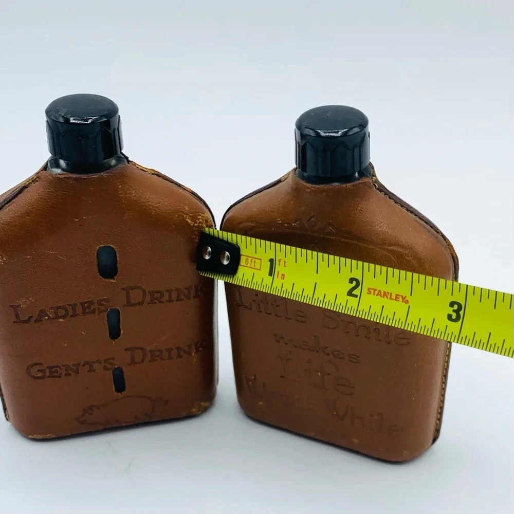Pair Of Vintage Souvenir Leather Wrapped Glass Whiskey Flasks